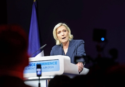 Marine Le Pen gives a speech on the day of the first round of parliamentary elections in Henin-Beaumont, France, on June 30. Marine Le Pen gives a speech on the day of the first round of parliamentary elections in Henin-Beaumont, France, on June 30.