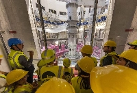 Members of the public look at the under-construction tokamak reactor at the ITER project in southern France on April 13. | © ITER Organization, http://www.iter.org/