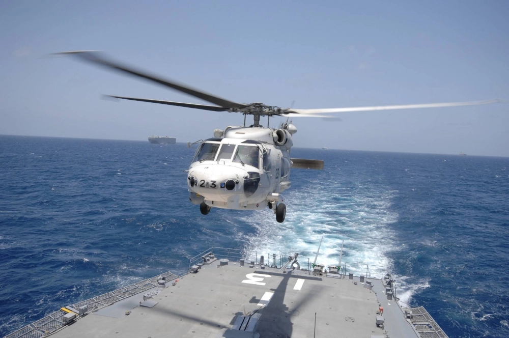 A Maritime Self-Defense Force's SH-60K helicopter. On April 20, two such helicopters collided during nighttime training off a remote island near Tokyo, killing all aboard. A Maritime Self-Defense Force's SH-60K helicopter. On April 20, two such helicopters collided during nighttime training off a remote island near Tokyo, killing all aboard.