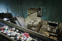 Plastic material is gathered at the end of the sorting process, baled and sent for further sorting or reprocessing. | Bloomberg