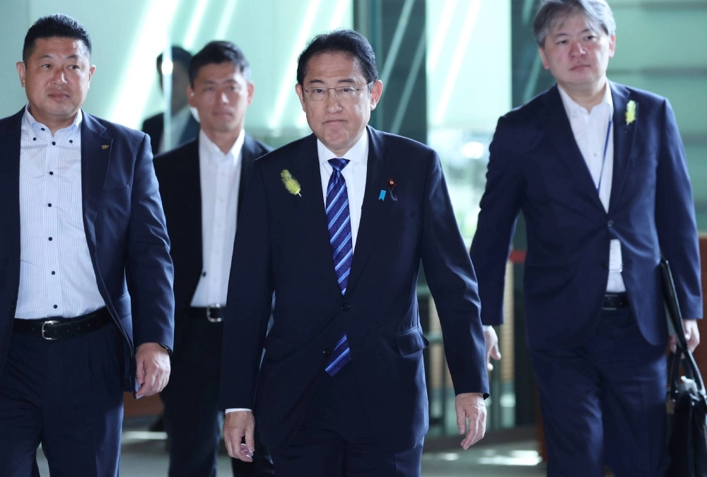 Prime Minister Fumio Kishida enters his office in Tokyo on July 4.  Prime Minister Fumio Kishida enters his office in Tokyo on July 4.