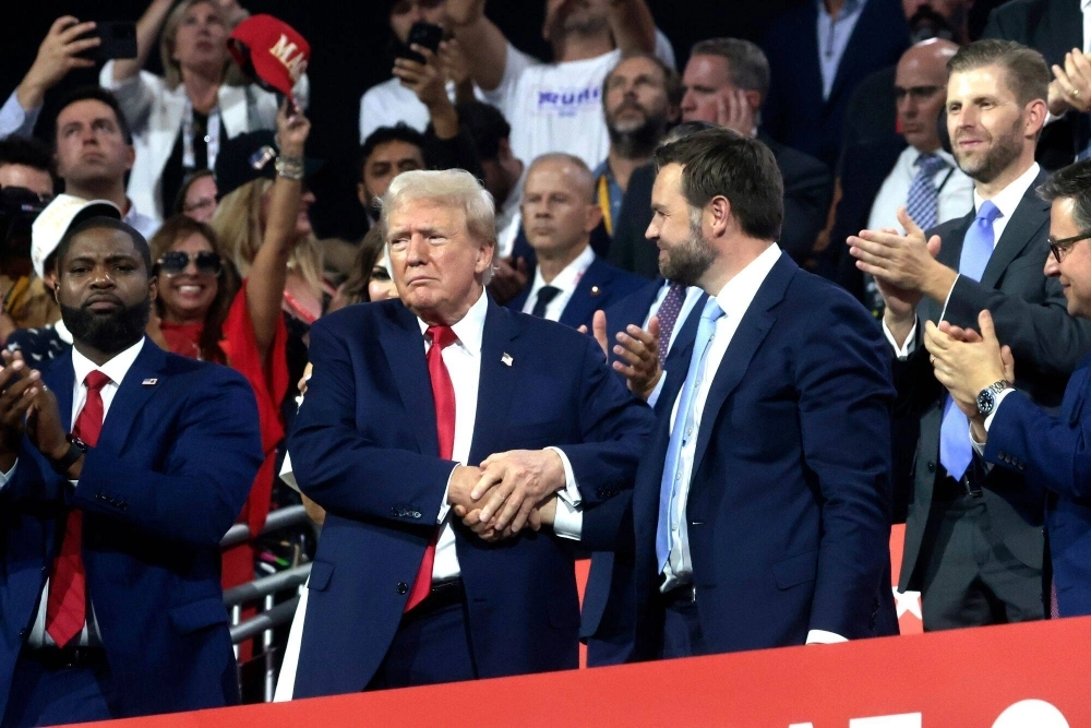 Former U.S. President Donald Trump and Ohio Sen. J.D. Vance (right), the Republican's vice-presidential nominee, attend the Republican National Convention in Milwaukee on Monday. Former U.S. President Donald Trump and Ohio Sen. J.D. Vance (right), the Republican's vice-presidential nominee, attend the Republican National Convention in Milwaukee on Monday.