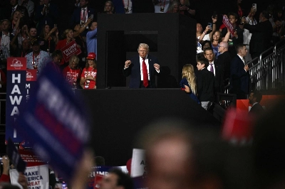 Former U.S. President Donald Trump, the Republican presidential nominee, gestures during the last day of the 2024 Republican National Convention at the Fiserv Forum in Milwaukee, Wisconsin, on Thursday. Former U.S. President Donald Trump, the Republican presidential nominee, gestures during the last day of the 2024 Republican National Convention at the Fiserv Forum in Milwaukee, Wisconsin, on Thursday.