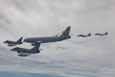 Two Air Self-Defense Force F-15s (right) escort two German Air Force Eurofighter jets and an A330MRTT aerial tanker on their arrival in Japan Friday. The ASDF is conducting training exercises with the German, French and Spanish air forces this weekend. Two Air Self-Defense Force F-15s (right) escort two German Air Force Eurofighter jets and an A330MRTT aerial tanker on their arrival in Japan Friday. The ASDF is conducting training exercises with the German, French and Spanish air forces this weekend.