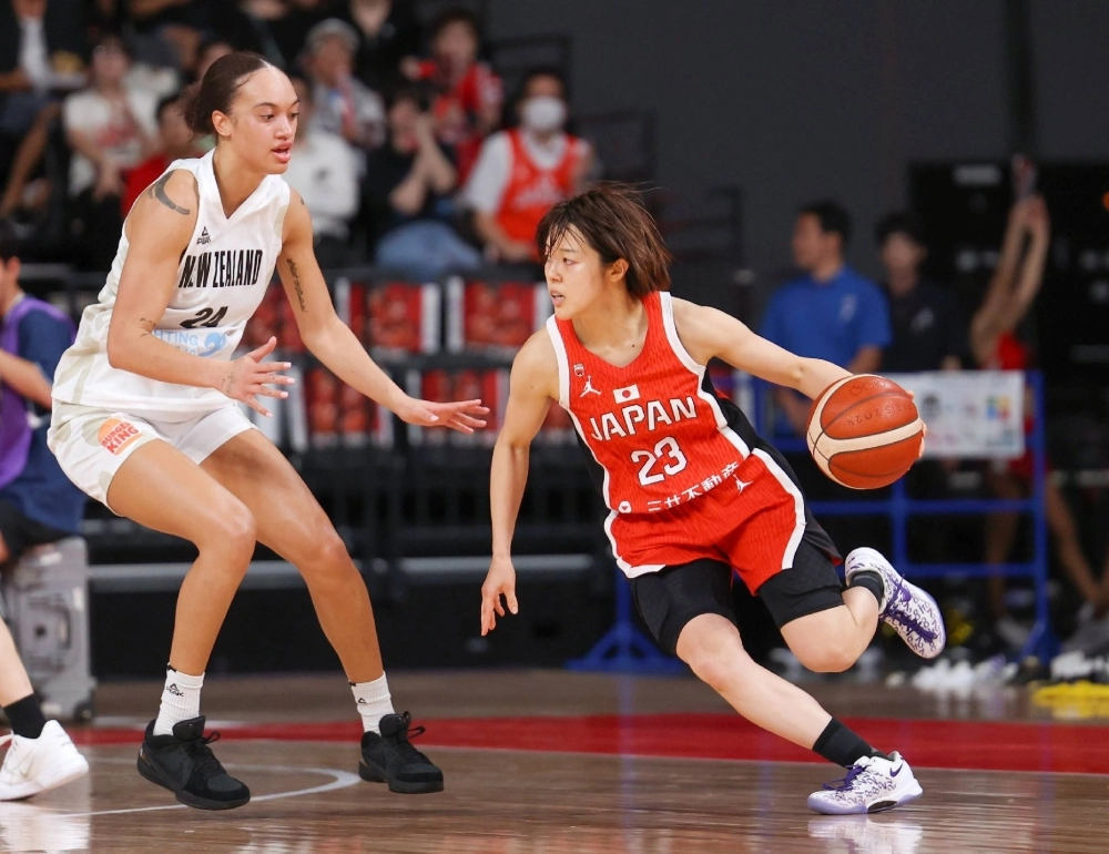 Mai Yamamoto drives to the basket during an Olympic tune-up game against New Zealand in Tokyo on July 4.  Mai Yamamoto drives to the basket during an Olympic tune-up game against New Zealand in Tokyo on July 4.