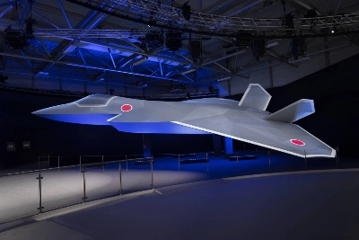 A full-scale model of the new design of a next-generation fighter that Japan, Italy and Britain plan to develop together is showcased Monday by Mitsubishi Heavy Industries, Leonardo and BAE Systems — the projects’ lead system integrators — at the Farnborough International Airshow near London on Monday. A full-scale model of the new design of a next-generation fighter that Japan, Italy and Britain plan to develop together is showcased Monday by Mitsubishi Heavy Industries, Leonardo and BAE Systems — the projects’ lead system integrators — at the Farnborough International Airshow near London on Monday.