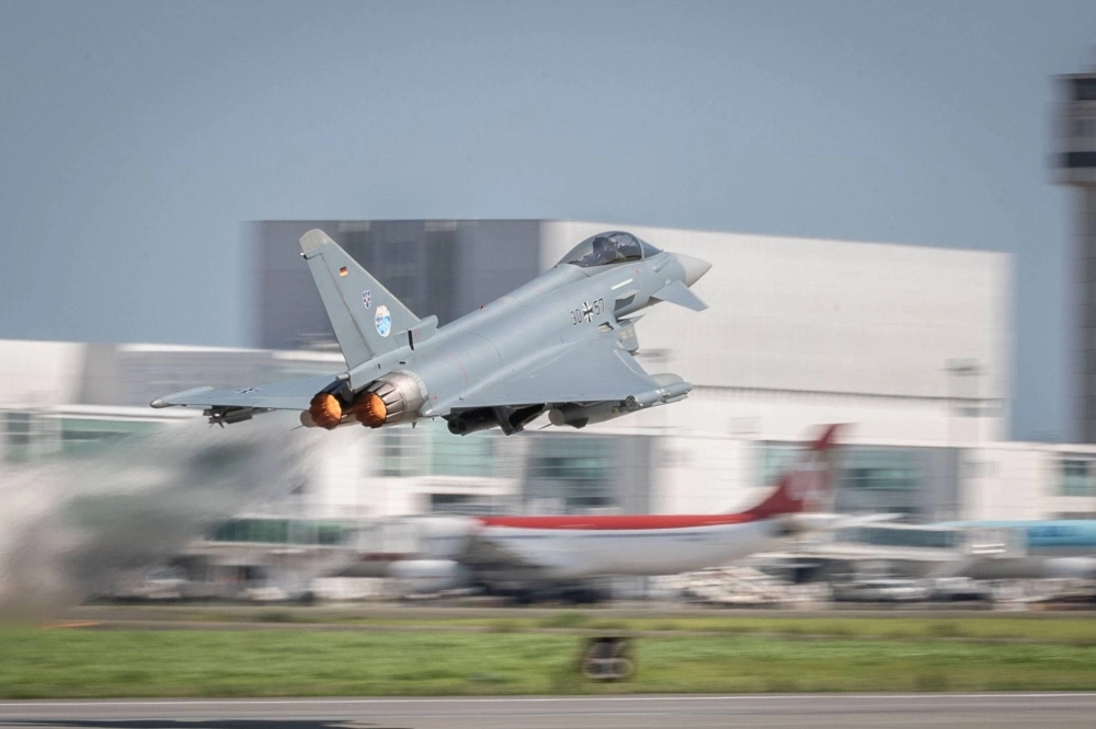 A German Air Force Eurofighter jet takes off from Chitose Airbase in Hokkaido during Germany and Japan's first-ever bilateral fighter exercise, which ran from Monday to Thursday. A German Air Force Eurofighter jet takes off from Chitose Airbase in Hokkaido during Germany and Japan's first-ever bilateral fighter exercise, which ran from Monday to Thursday.