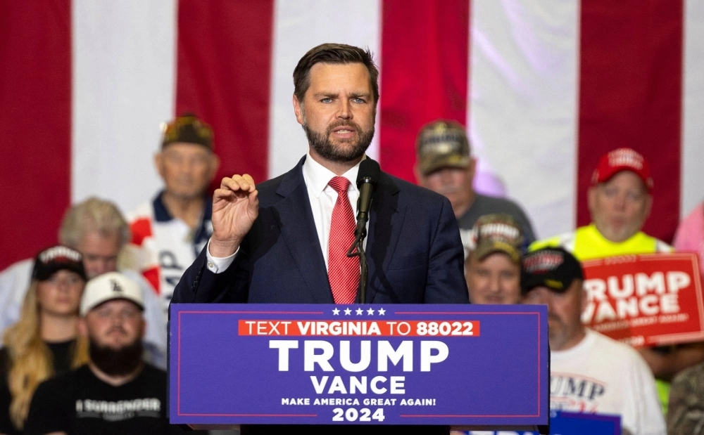 U.S. Sen. J.D. Vance, the Republican vice presidential nominee, addresses a crowd of supporters during a campaign event at Radford University in Radford, Virginia, on Monday. U.S. Sen. J.D. Vance, the Republican vice presidential nominee, addresses a crowd of supporters during a campaign event at Radford University in Radford, Virginia, on Monday.