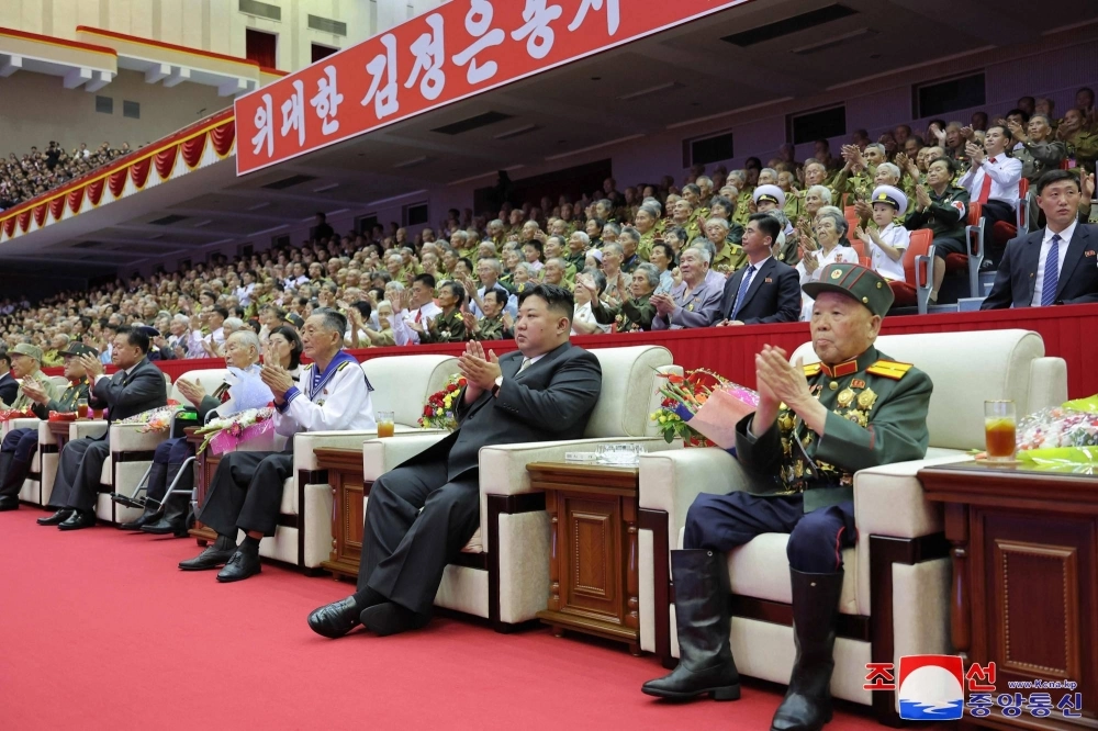 North Korean leader Kim Jong Un (center) attends a ceremony with military veterans to mark the 71st anniversary of the end of the Korean War in Pyongyang on Saturday. North Korean leader Kim Jong Un (center) attends a ceremony with military veterans to mark the 71st anniversary of the end of the Korean War in Pyongyang on Saturday.