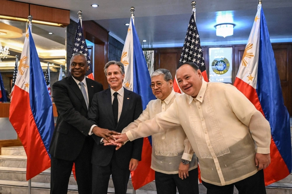 U.S. Secretary of Defense Lloyd Austin (left), U.S. Secretary of State Antony Blinken (second from left), Philippine Foreign Affairs Secretary Enrique Manalo (second from right), and Philippine Defense Secretary Gilberto Teodoro pose for a photo ahead of the allies' "two-plus-two" meeting at Camp Aguinaldo in Quezon City, Metro Manila, on Tuesday. U.S. Secretary of Defense Lloyd Austin (left), U.S. Secretary of State Antony Blinken (second from left), Philippine Foreign Affairs Secretary Enrique Manalo (second from right), and Philippine Defense Secretary Gilberto Teodoro pose for a photo ahead of the allies' "two-plus-two" meeting at Camp Aguinaldo in Quezon City, Metro Manila, on Tuesday.