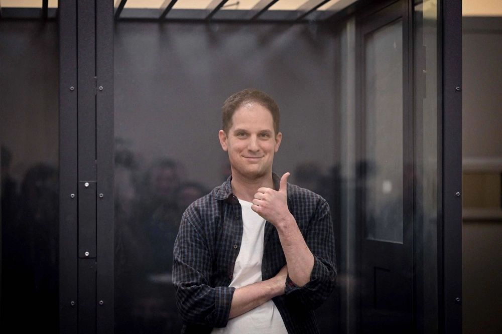 U.S. journalist Evan Gershkovich, arrested on espionage charges, inside a defendants' cage in Moscow on April 23. U.S. journalist Evan Gershkovich, arrested on espionage charges, inside a defendants' cage in Moscow on April 23.