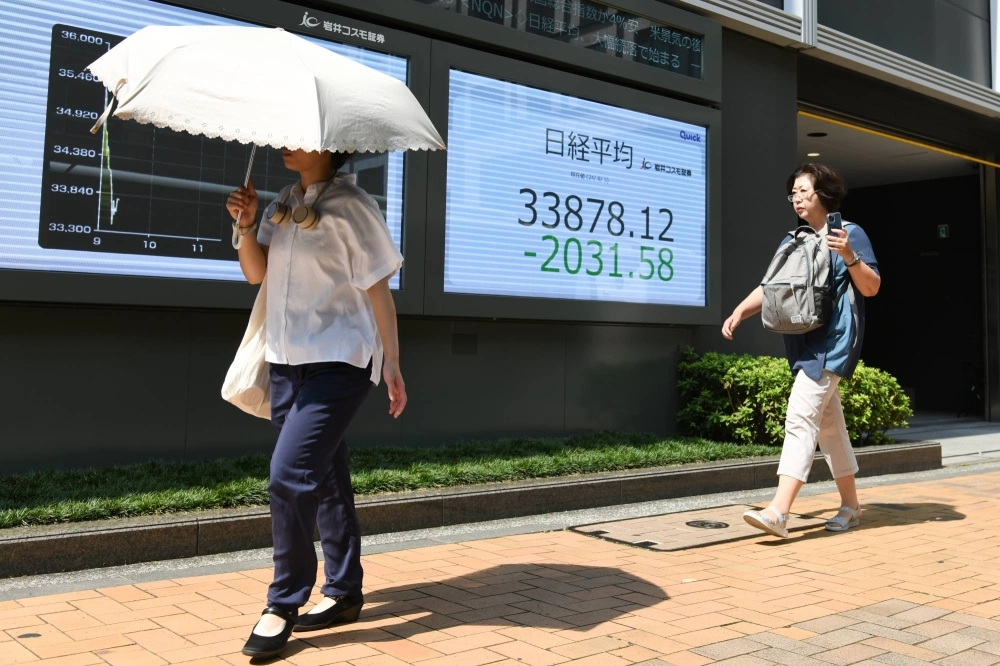 The turmoil affecting global markets came on the heels of Bank of Japan Gov. Kazuo Ueda’s decision to raise rates, but you can't fault him given the volatile worldwide economic conditions. The turmoil affecting global markets came on the heels of Bank of Japan Gov. Kazuo Ueda’s decision to raise rates, but you can't fault him given the volatile worldwide economic conditions.