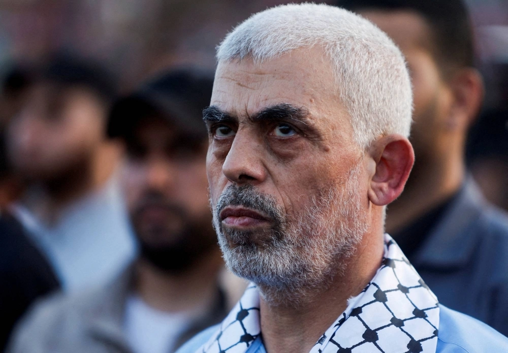 Hamas leader Yahya Sinwar looks on as Hamas supporters take part in an anti-Israel rally in Gaza City on Oct. 1, 2022.  Hamas leader Yahya Sinwar looks on as Hamas supporters take part in an anti-Israel rally in Gaza City on Oct. 1, 2022.