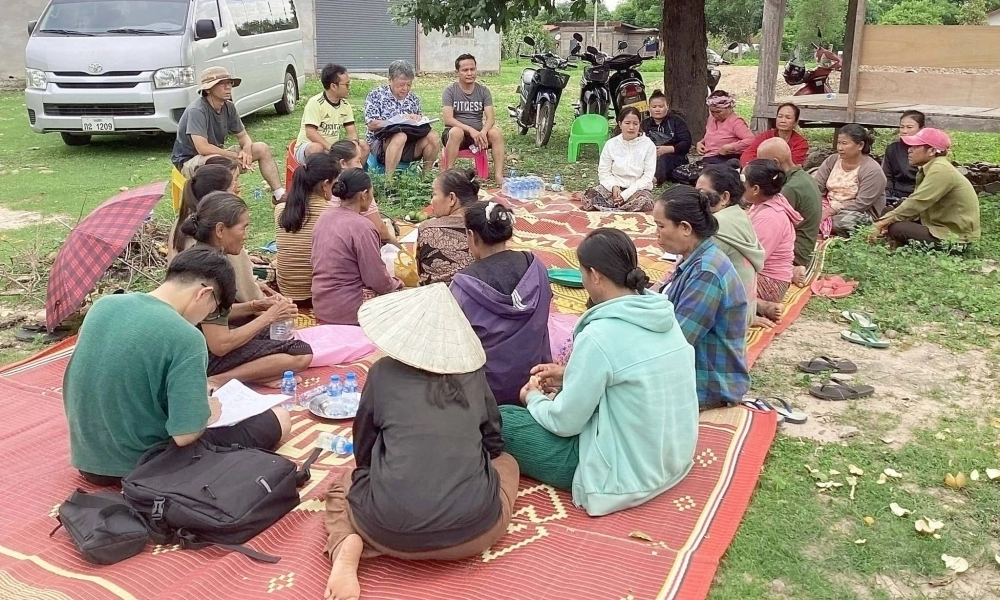 A meeting of the Lao-Lao liquor cooperative held in the village of Xai in Attapeu Province in June. A meeting of the Lao-Lao liquor cooperative held in the village of Xai in Attapeu Province in June.
