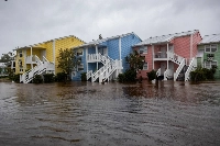 Homes surrounded by floodwaters in Steinhatchee, Florida, after Hurricane Debby made landfall on Aug. 5. | Bloomberg