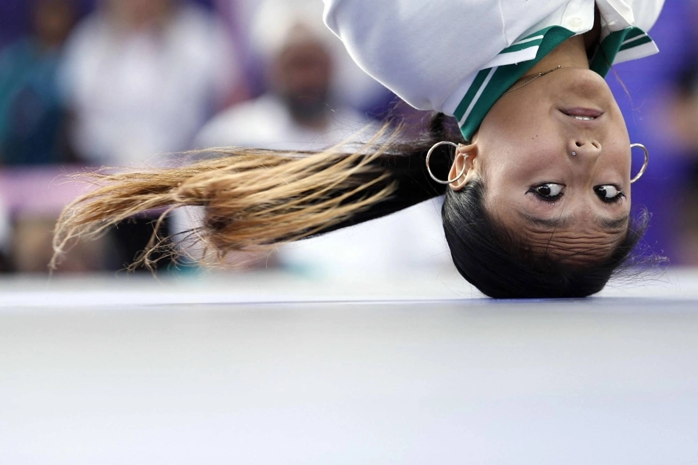 American Logan Edra, known as Logistx, competes in the women's breaking competition at the Paris Olympics on Friday.  American Logan Edra, known as Logistx, competes in the women's breaking competition at the Paris Olympics on Friday.