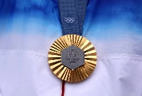 The gold medal of Lim Si-hyeon of South Korea, after the Women’s Individual Archery competition at the Olympic Games Paris 2024, on Aug. 3 | Getty Images Europe / via Bloomberg