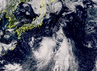 A satellite image from Wednesday afternoon shows Tropical Storm Ampil south of Japan  | Meteorological Agency