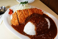 Three Tokyo restaurants claim to be the inventor of Japan's 'katsu karē' (breaded and fried pork served with Japanese curry), but Ginza Swiss' take (pictured) may be the most unique. | CASSANDRA LORD