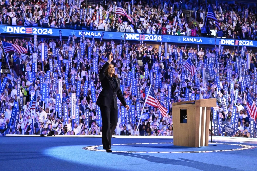 U.S. Vice President and Democratic presidential candidate Kamala Harris arrives onstage Thursday to speak on the fourth and final day of the Democratic National Convention in Chicago.  U.S. Vice President and Democratic presidential candidate Kamala Harris arrives onstage Thursday to speak on the fourth and final day of the Democratic National Convention in Chicago.