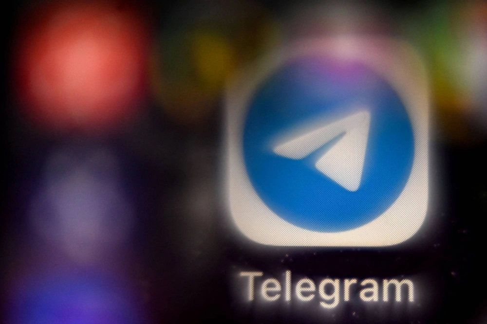A picture taken in 2021 in Moscow shows the mobile messaging and call service Telegram logo on a smartphone screen. French judicial authorities extended the detention of the Russian-born founder and chief of Telegram Pavel Durov on Sunday after his arrest at an airport near Paris over alleged offenses related to the popular but controversial messaging app. A picture taken in 2021 in Moscow shows the mobile messaging and call service Telegram logo on a smartphone screen. French judicial authorities extended the detention of the Russian-born founder and chief of Telegram Pavel Durov on Sunday after his arrest at an airport near Paris over alleged offenses related to the popular but controversial messaging app.
