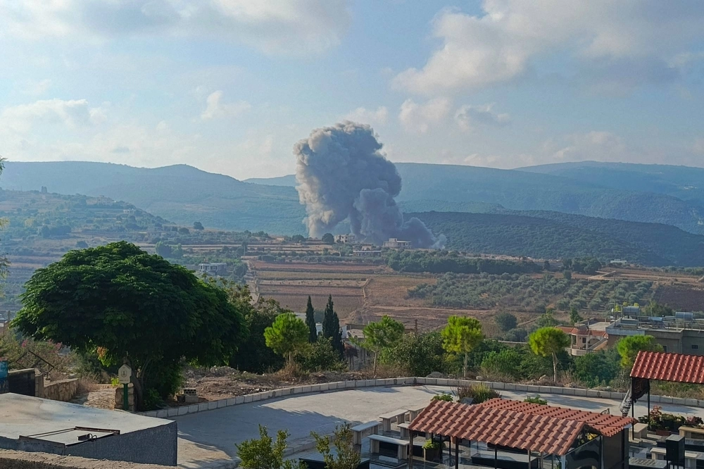 Smoke billows from an area targeted by an Israeli airstrike between the southern Lebanese border villages of Zibqin and Yater on Sunday. Smoke billows from an area targeted by an Israeli airstrike between the southern Lebanese border villages of Zibqin and Yater on Sunday.