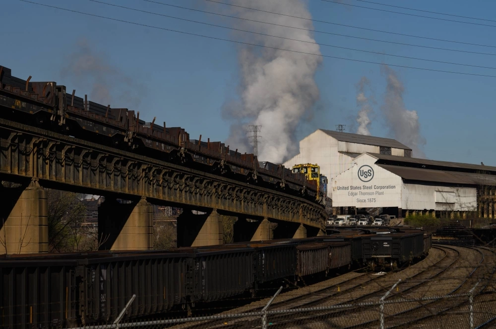 A train carrying steel slabs leaves the U.S. Steel Edgar Thomson Works steel mill in Braddock, Pennsylvania. A train carrying steel slabs leaves the U.S. Steel Edgar Thomson Works steel mill in Braddock, Pennsylvania.