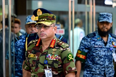 Gen. Waker-uz-Zaman, Bangladesh's army chief, arrives at Dhaka International Airport to receive Nobel laureate Muhammad Yunus on Aug. 8 to lead the country's interim government. Gen. Waker-uz-Zaman, Bangladesh's army chief, arrives at Dhaka International Airport to receive Nobel laureate Muhammad Yunus on Aug. 8 to lead the country's interim government.