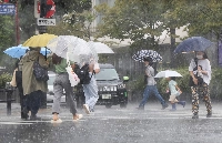 Torrential rain in Tokyo's Setagaya Ward on Friday as Shanshan brought heavy precipitation to the capital. | Jiji