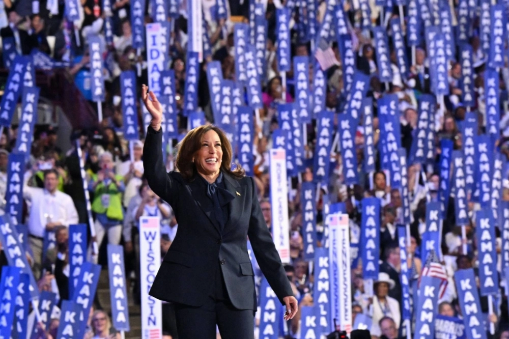 U.S. Vice President and 2024 Democratic presidential candidate Kamala Harris waves as she arrives to speak on the fourth and last day of the Democratic National Convention at the United Center in Chicago on Aug. 22. U.S. Vice President and 2024 Democratic presidential candidate Kamala Harris waves as she arrives to speak on the fourth and last day of the Democratic National Convention at the United Center in Chicago on Aug. 22.
