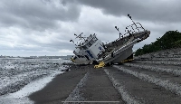 A washed-up boat on the shore of the city of Ibusuki, Kagoshima Prefecture, on Friday | Courtesy of James Reynolds