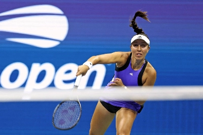 American Jessica Pegula serves to Poland's Iga Swiatek during their women's quarterfinal on Wednesday at the U.S. Open in New York.  American Jessica Pegula serves to Poland's Iga Swiatek during their women's quarterfinal on Wednesday at the U.S. Open in New York.