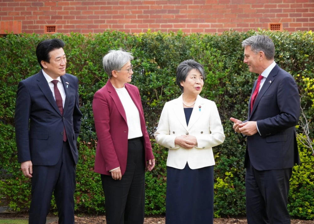 Japanese Defense Minister Minoru Kihara (left), Australian Foreign Minister Penny Wong (center left), Japanese Foreign Minister Yoko Kamikawa (center right) and Australian Defense Minister Richard Marles gather for their two-plus-two meeting in Queenscliff, Australia, on Thursday. Japanese Defense Minister Minoru Kihara (left), Australian Foreign Minister Penny Wong (center left), Japanese Foreign Minister Yoko Kamikawa (center right) and Australian Defense Minister Richard Marles gather for their two-plus-two meeting in Queenscliff, Australia, on Thursday.