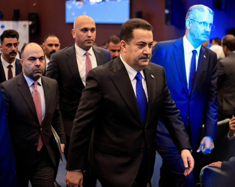 The agreement follows more than six months of talks between Baghdad and Washington, initiated by Prime Minister Mohammed Shia al-Sudani (center) in January amid attacks by Iran-backed Iraqi armed groups on U.S. forces stationed at Iraqi bases. The agreement follows more than six months of talks between Baghdad and Washington, initiated by Prime Minister Mohammed Shia al-Sudani (center) in January amid attacks by Iran-backed Iraqi armed groups on U.S. forces stationed at Iraqi bases.