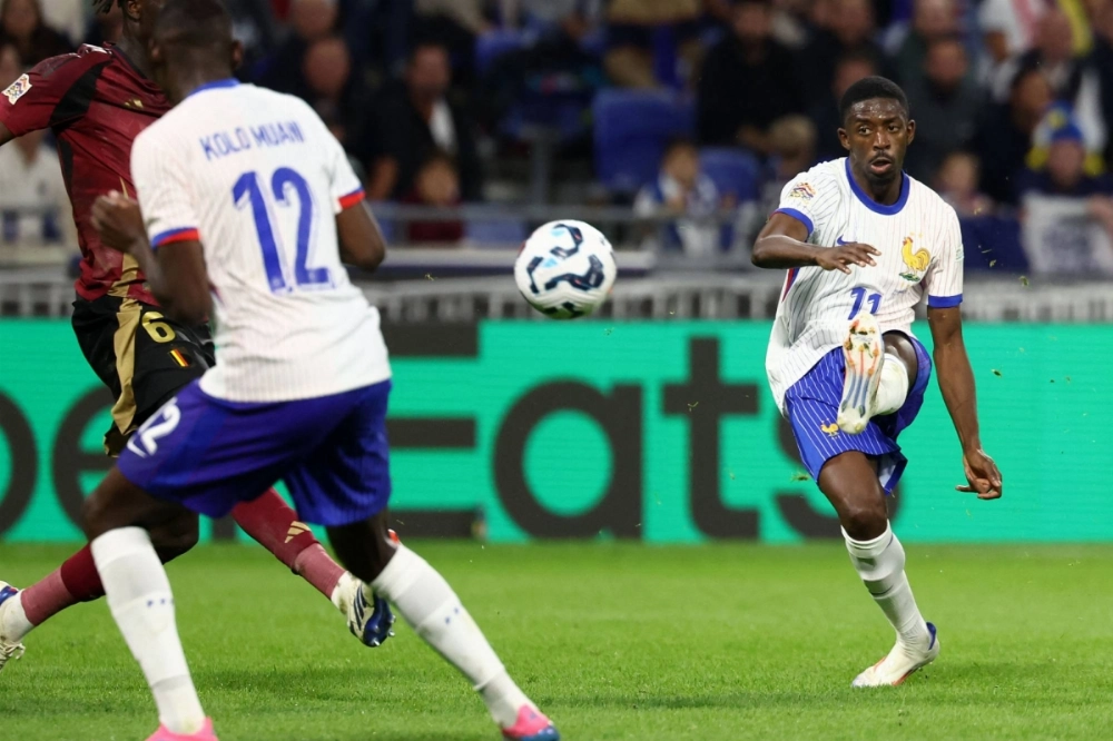 France forward Ousmane Dembele (right) shoots toward the goal during a UEFA Nations League match against Belgium in Lyon, France, on Monday. France forward Ousmane Dembele (right) shoots toward the goal during a UEFA Nations League match against Belgium in Lyon, France, on Monday.