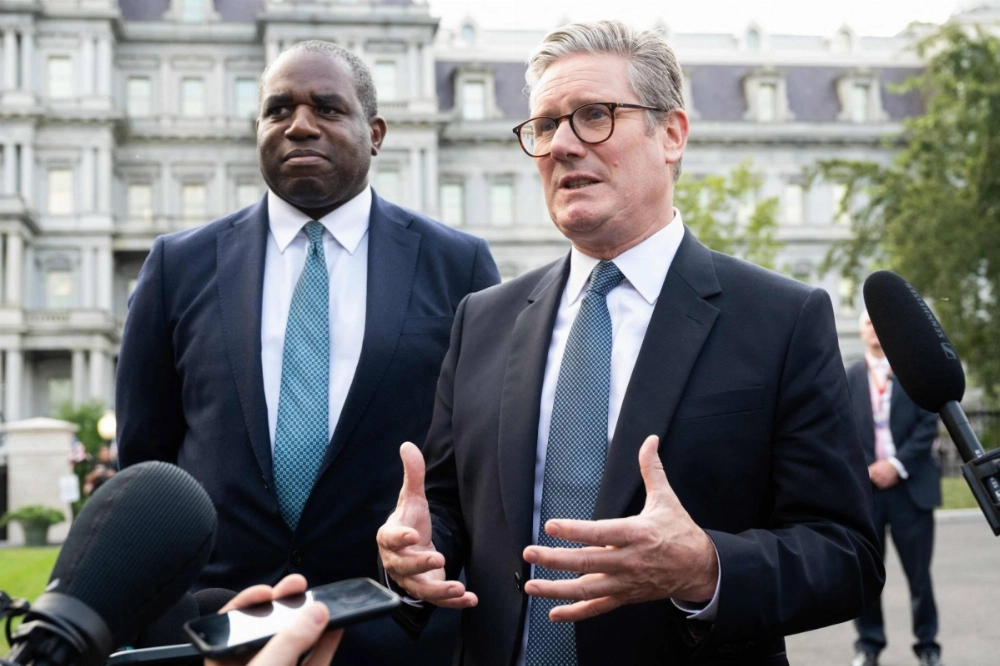 British Prime Minister Keir Starmer (right) and British Foreign Secretary David Lammy speak to the media outside of the West Wing of the White House in Washington on Friday following a meeting with U.S. President Joe Biden. British Prime Minister Keir Starmer (right) and British Foreign Secretary David Lammy speak to the media outside of the West Wing of the White House in Washington on Friday following a meeting with U.S. President Joe Biden.