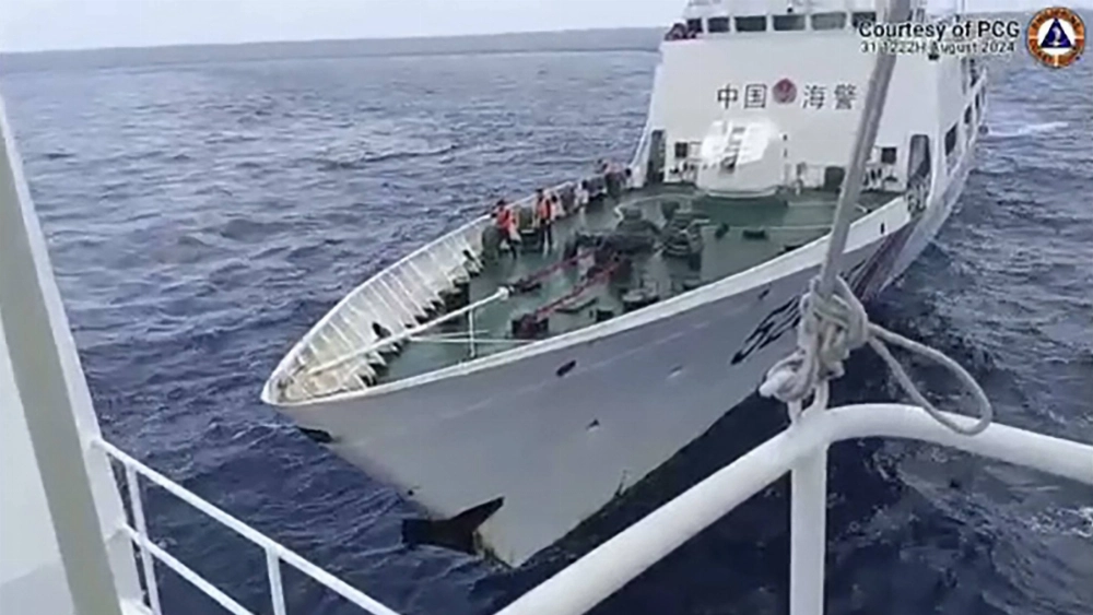 A screenshot from video taken on Aug. 31 shows a China Coast Guard ship colliding with the Philippine Coast Guard ship BRP Teresa Magbanua near Sabina Shoal in the South China Sea. A screenshot from video taken on Aug. 31 shows a China Coast Guard ship colliding with the Philippine Coast Guard ship BRP Teresa Magbanua near Sabina Shoal in the South China Sea.