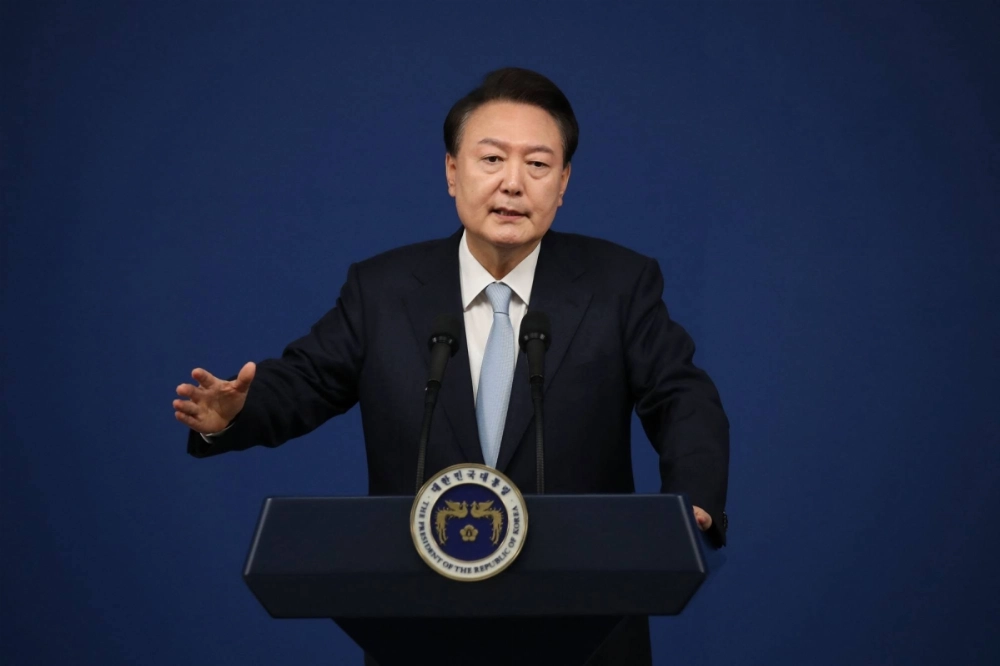 South Korean President Yoon Suk-yeol speaks during a news conference at the presidential office in Seoul on Aug. 29. South Korean President Yoon Suk-yeol speaks during a news conference at the presidential office in Seoul on Aug. 29.