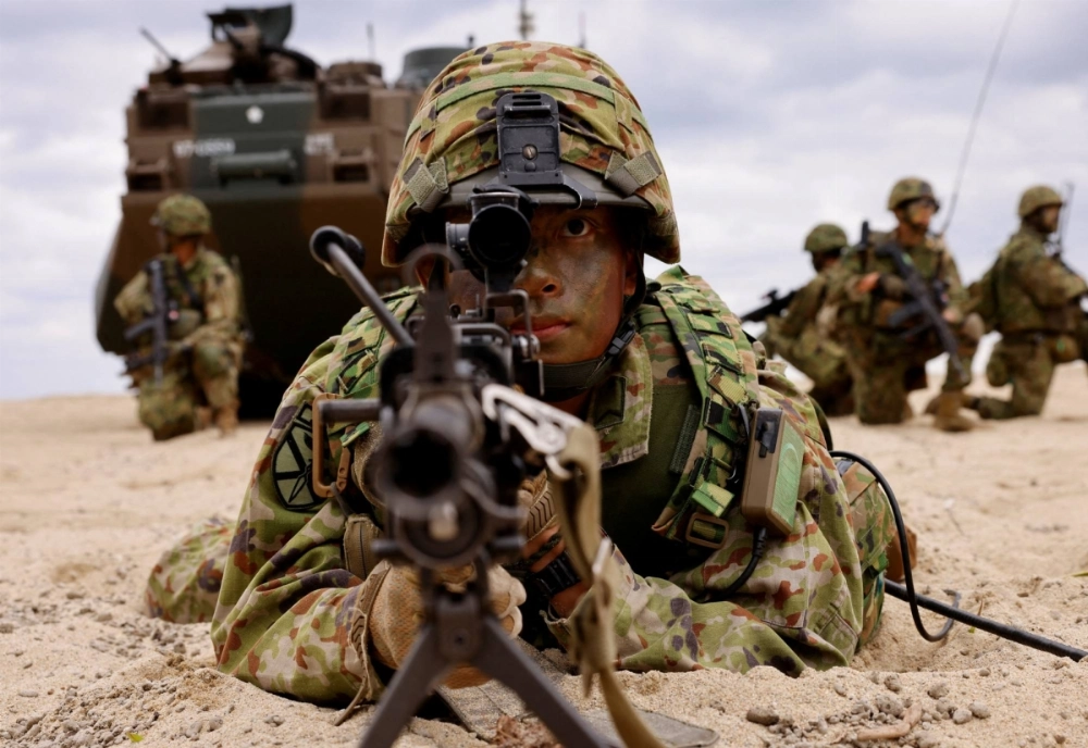 Troops from the Ground Self-Defense Force take part in the 05JX military exercises on the island of Tokunoshima in Kagoshima Prefecture last November. While Japan's overall ranking in the 2024 Asia Power Index dropped, it scored improvements in the defense and security sphere. Troops from the Ground Self-Defense Force take part in the 05JX military exercises on the island of Tokunoshima in Kagoshima Prefecture last November. While Japan's overall ranking in the 2024 Asia Power Index dropped, it scored improvements in the defense and security sphere.