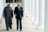 U.S. President Joe Biden, right, and Sheikh Mohammed bin Zayed Al Nahyan, United Arab Emirate's president, walk through the White House in Washington on Monday. | Bloomberg