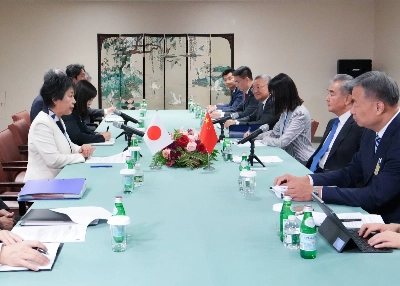 Foreign Minister Yoko Kamikawa (left) holds talks with China's top diplomat, Wang Yi (right center), during their 55-minute meeting at United Nations headquarters in New York on Monday. Foreign Minister Yoko Kamikawa (left) holds talks with China's top diplomat, Wang Yi (right center), during their 55-minute meeting at United Nations headquarters in New York on Monday.