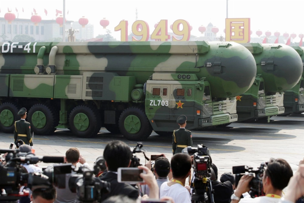 Chinese military vehicles carrying DF-41 intercontinental ballistic missiles travel past Beijing's Tiananmen Square during a military parade marking the 70th anniversary of the founding of the People's Republic of China, on Oct. 1, 2019. Chinese military vehicles carrying DF-41 intercontinental ballistic missiles travel past Beijing's Tiananmen Square during a military parade marking the 70th anniversary of the founding of the People's Republic of China, on Oct. 1, 2019.