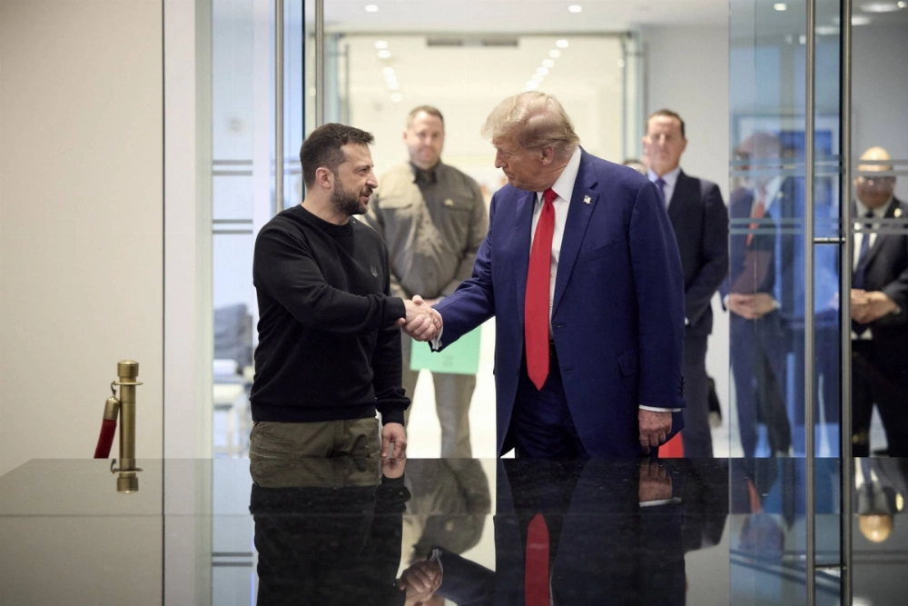 Ukrainian President Volodymyr Zelenskyy and Republican presidential nominee and former U.S. President Donald Trump, shake hands during a meeting on Friday in New York. Ukrainian President Volodymyr Zelenskyy and Republican presidential nominee and former U.S. President Donald Trump, shake hands during a meeting on Friday in New York.