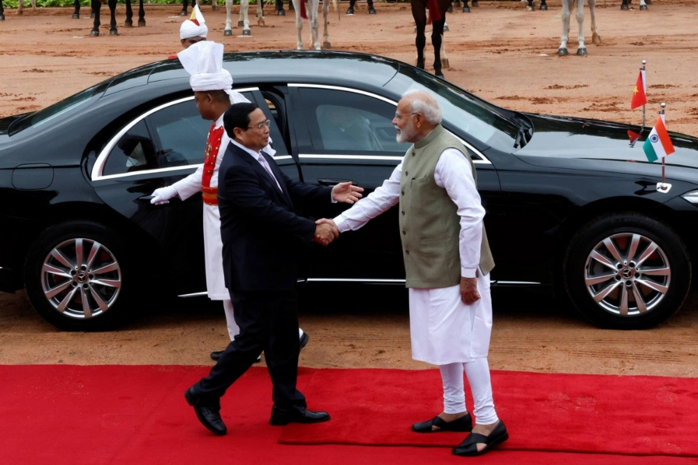 Vietnamese Prime Minister Pham Minh Chinh meets his Indian counterpart, Narendra Modi, in New Delhi on Aug. 1. In a matter of three months, Vietnam's leadership engaged India, Russia and China while securing billions in U.S. and Western investments by positioning itself as a manufacturing alternative to China. Vietnamese Prime Minister Pham Minh Chinh meets his Indian counterpart, Narendra Modi, in New Delhi on Aug. 1. In a matter of three months, Vietnam's leadership engaged India, Russia and China while securing billions in U.S. and Western investments by positioning itself as a manufacturing alternative to China.