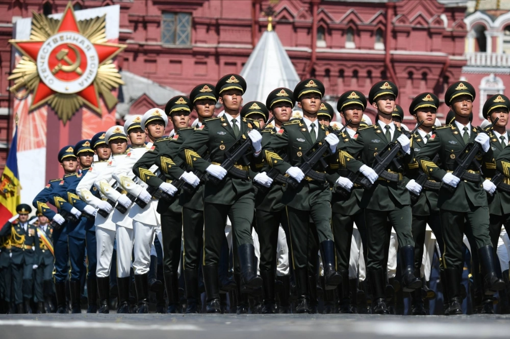 Chinese People’s Liberation Army soldiers march in the Victory Day Parade in Moscow in 2020. China and Russia are working together to undermine the liberal international order through military means. Chinese People’s Liberation Army soldiers march in the Victory Day Parade in Moscow in 2020. China and Russia are working together to undermine the liberal international order through military means.