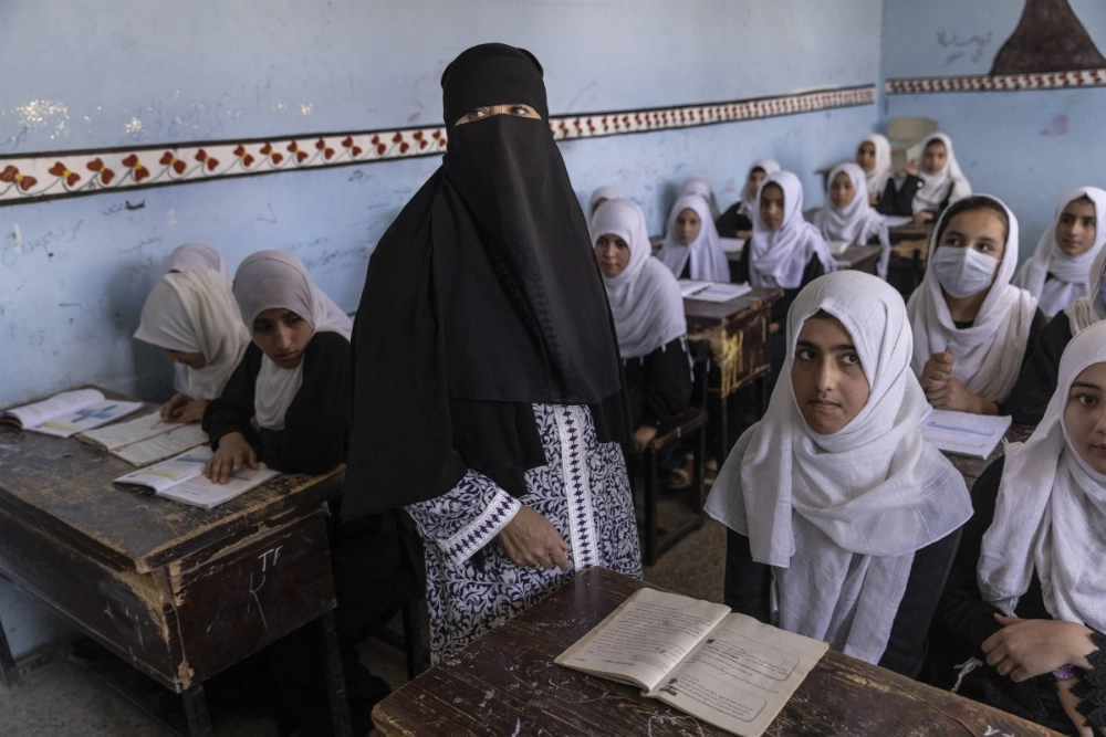 A classroom in a girls' school in Kabul a few days before a September 2021 announcement that women would be indefinitely banned from the institution both as instructors and students. A classroom in a girls' school in Kabul a few days before a September 2021 announcement that women would be indefinitely banned from the institution both as instructors and students.