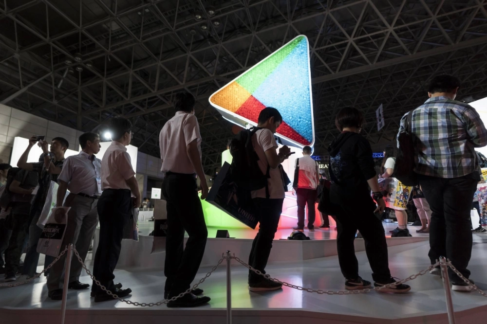 Attendees stand in front of the Google Play booth during the Tokyo Game Show in September 2018 in Chiba. Attendees stand in front of the Google Play booth during the Tokyo Game Show in September 2018 in Chiba.