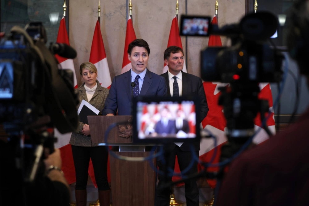 Justin Trudeau, Canada's prime minister (center) Melanie Joly, Canada's foreign minister (left) and Dominic LeBlanc, Canada's public safety, democratic institutions and intergovernmental affairs minister, during a news conference in Ottawa on Monday.  Justin Trudeau, Canada's prime minister (center) Melanie Joly, Canada's foreign minister (left) and Dominic LeBlanc, Canada's public safety, democratic institutions and intergovernmental affairs minister, during a news conference in Ottawa on Monday.