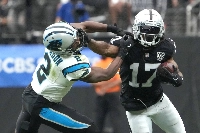 Raiders receiver Davante Adams carries the ball against the Panthers during their game on Sept. 22. Adams was traded to the Jets on Tuesday and is expected to make his debut with the team on Sunday.  | Imagn Images / VIA REUTERS