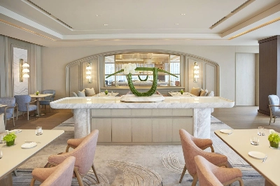The earth tones and suave furnishings of Sezanne's dining room come courtesy of Hong Kong designer Andre Fu. The earth tones and suave furnishings of Sezanne's dining room come courtesy of Hong Kong designer Andre Fu.